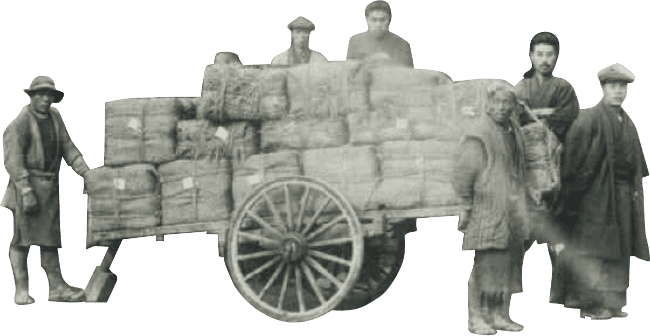 荷車で荷物を運ぶ人々